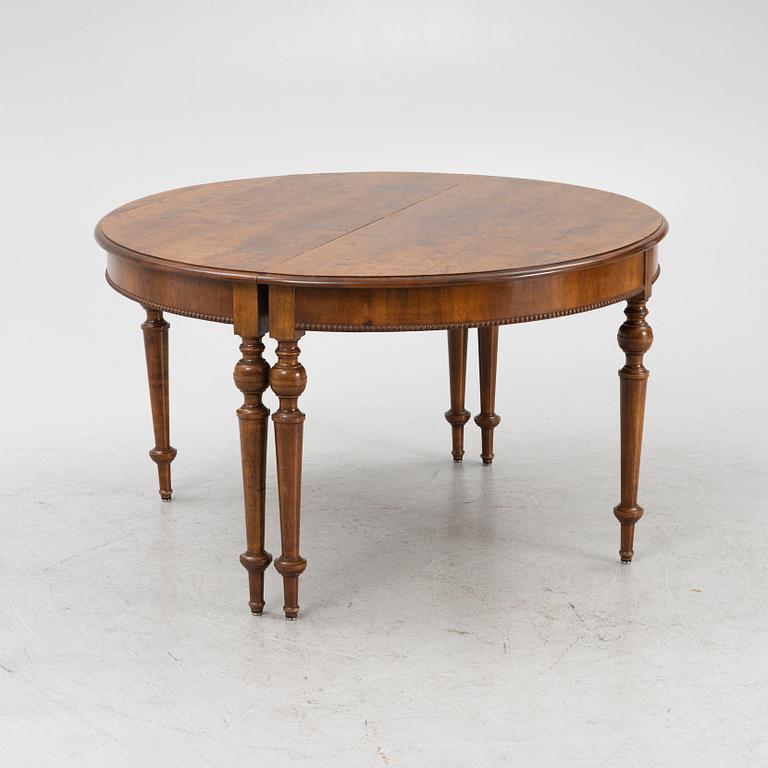 A dining table, late 19th Century.