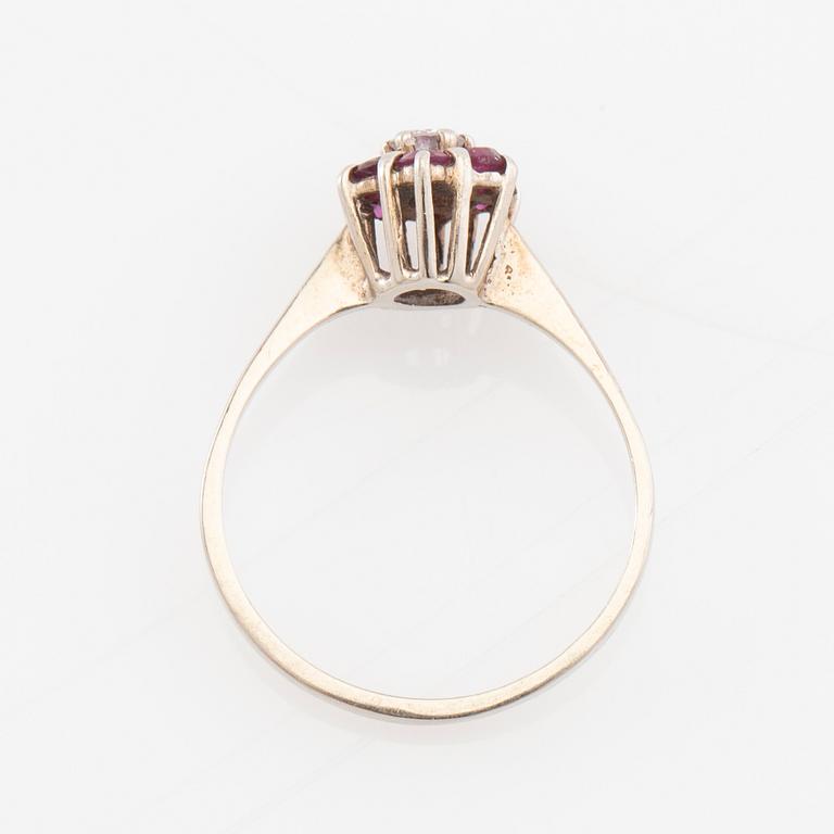 Ring 14K white gold set with a round brilliant-cut diamond and faceted rubies, Finland 1975.