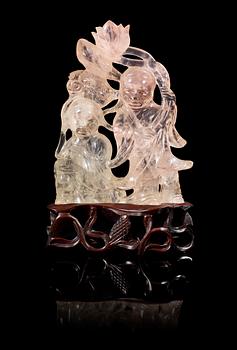 1352. A carved rose quartz figure group, China early 20th Century.