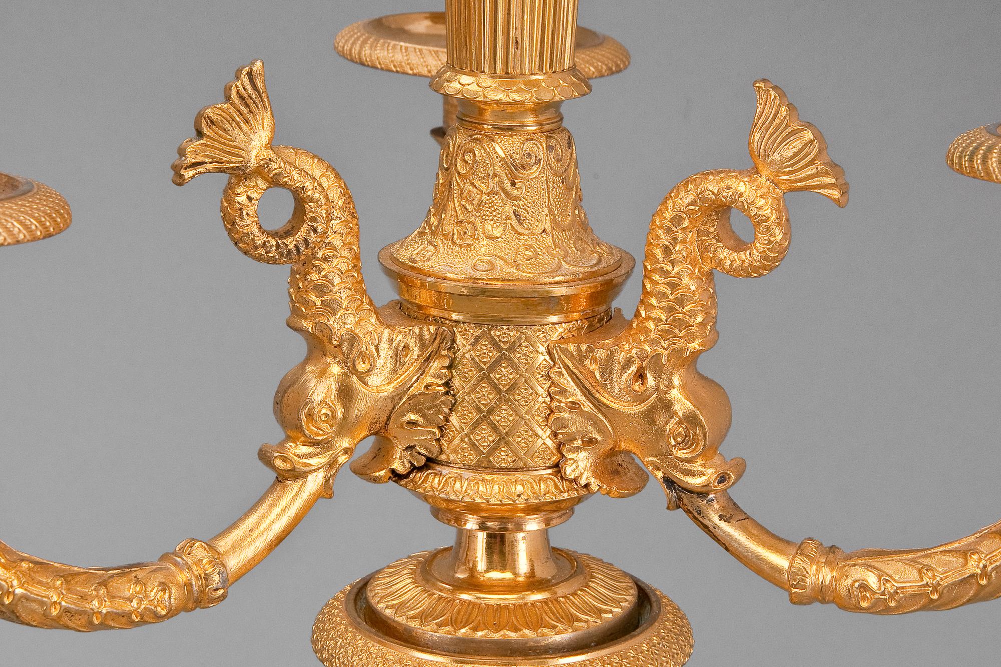 A PAIR OF FIVE LIGHT CANDELABRAS.