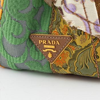 Prada, a embroidered silk 'Broccato patch' bag.