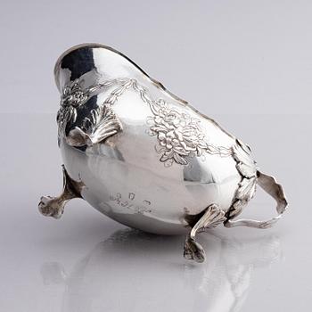 A Swedish Rococo 18th century parcel-gilt silver cream-jug, mark of Jacob Lampa, Stockholm 1774.
