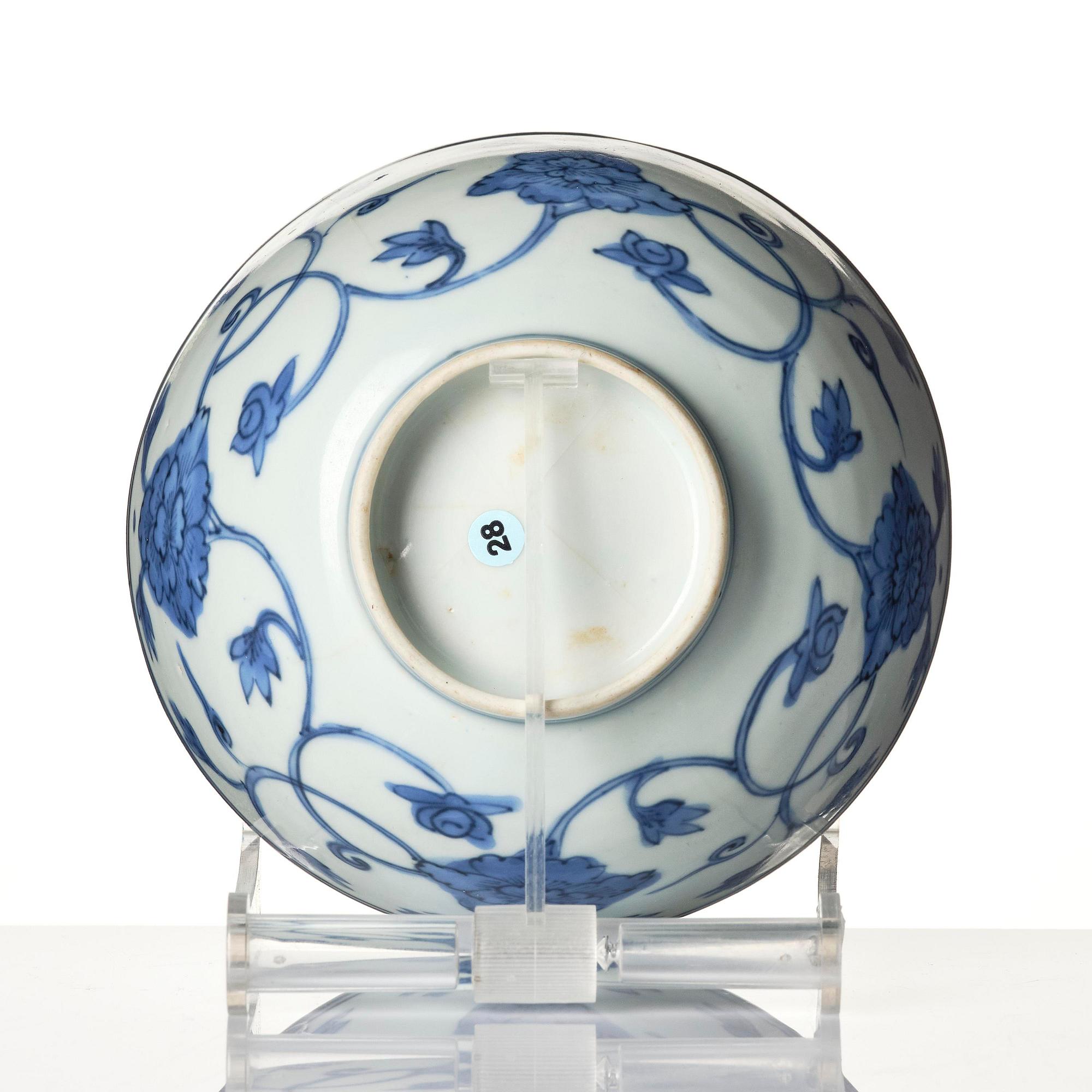A blue and white 'floral' bowl and a dish, Ming dynasty, Jiajing (1522-1566).