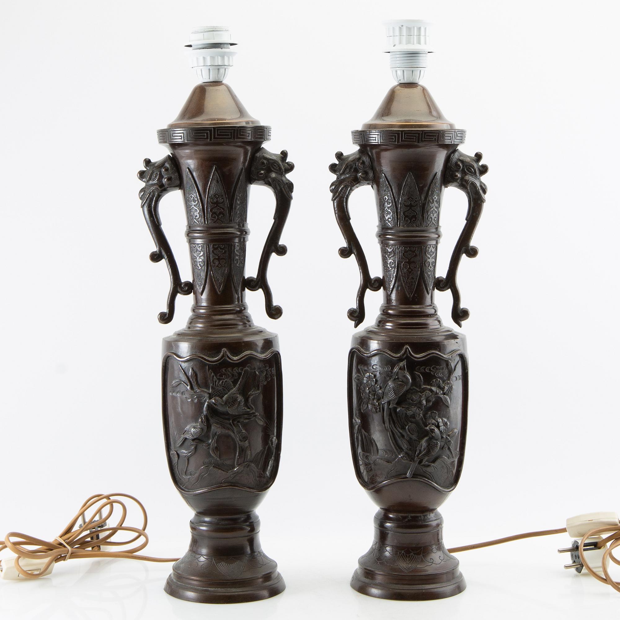 Table lamps a pair China 20th century patinated metal.