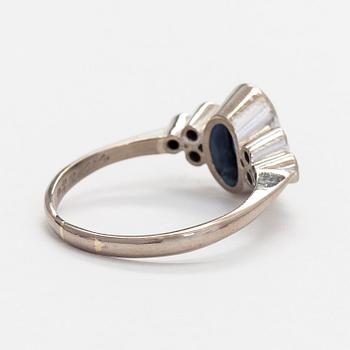A. Tillander, ring, faceted sapphire, brilliant cut diamonds, 18K white gold, Helsinki 1983.