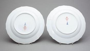 A pair of Meissen dinner plates, "Scattered flowers" with Kaiser Wilhelm II's monogram, dated 1894 and 1897.