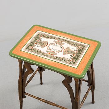 An early 20th century art nouveau table.