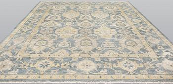 An oriental carpet, ca 425 x 300 cm.