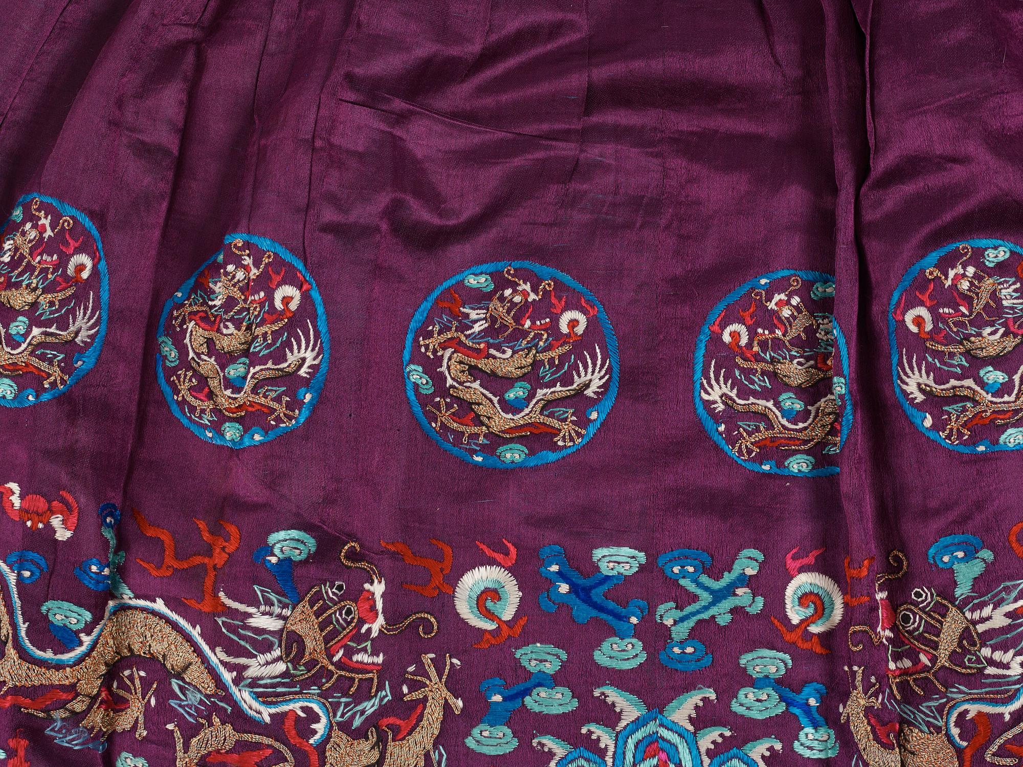 An embroidered silk skirt, Qing dynasty (1644-1912).