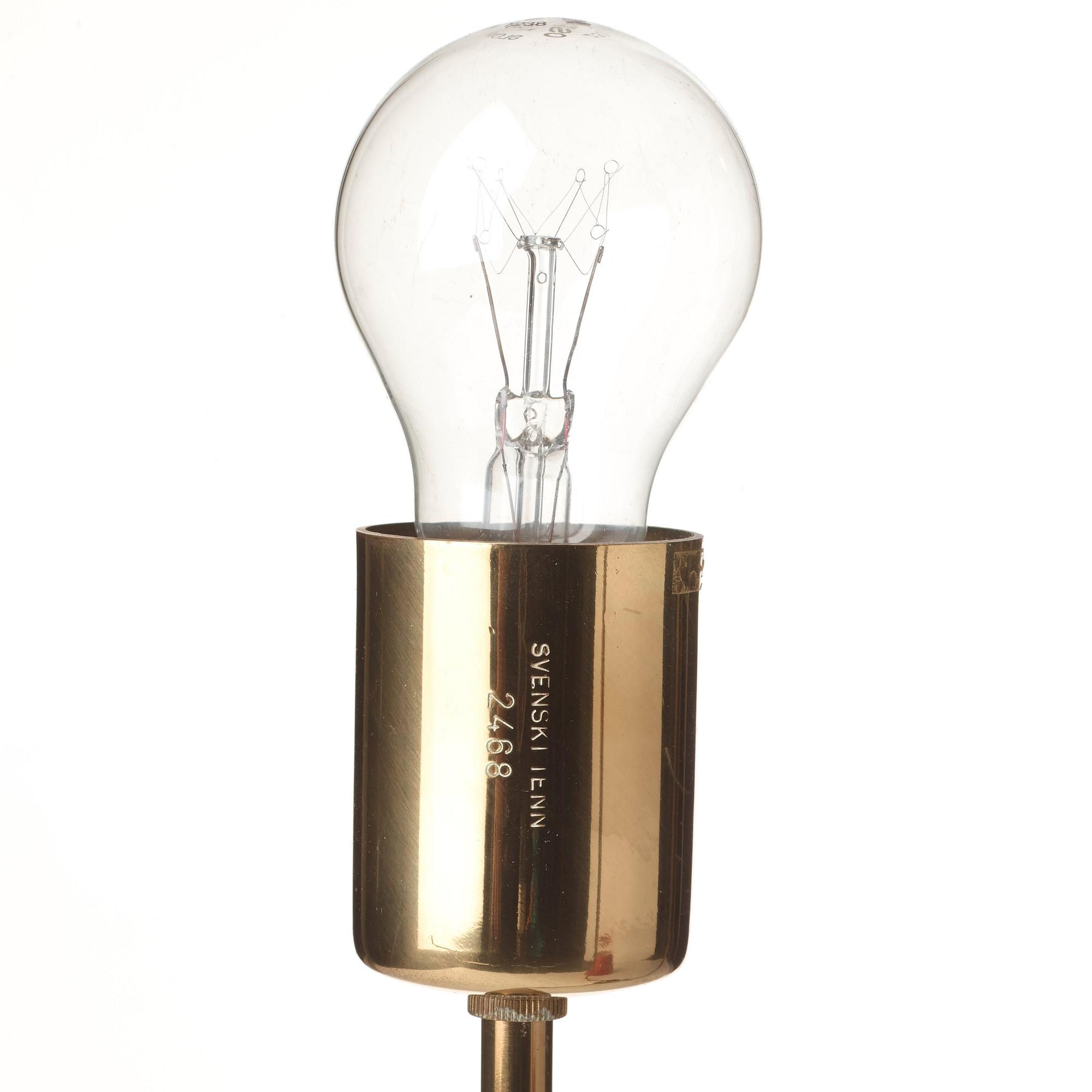 Josef Frank, a brass three light table lamp, Svenskt Tenn, Sweden, model G 2468.