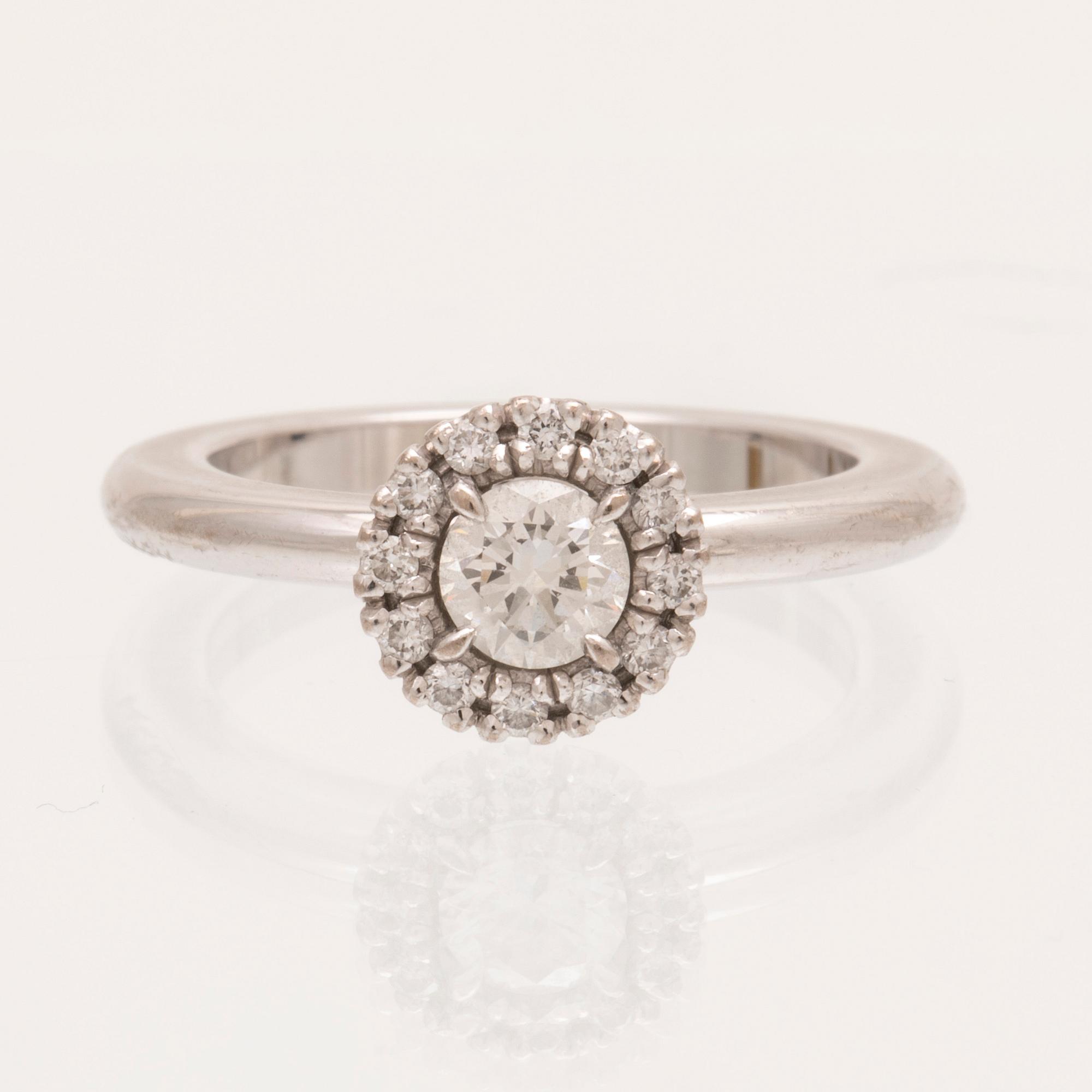 An 18K white gold ring with round brilliant cut diamonds by Engelbert, with GIA dossier.