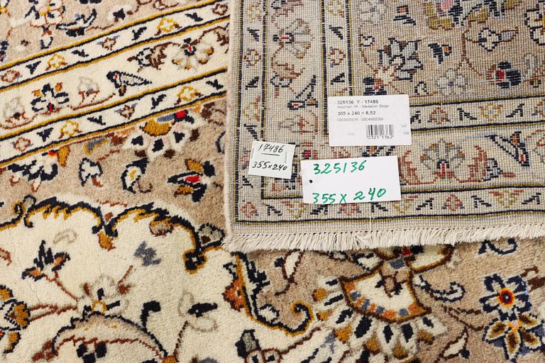 A Keshan carpet, c. 355 x 240 cm.
