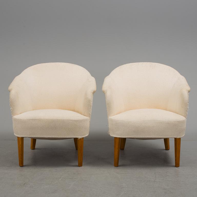 A pair of "Samspel" easy chairs by Carl Malmsten.