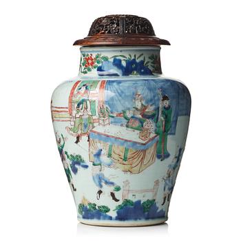 769. A Transitional Wucai jar, 17th Century.