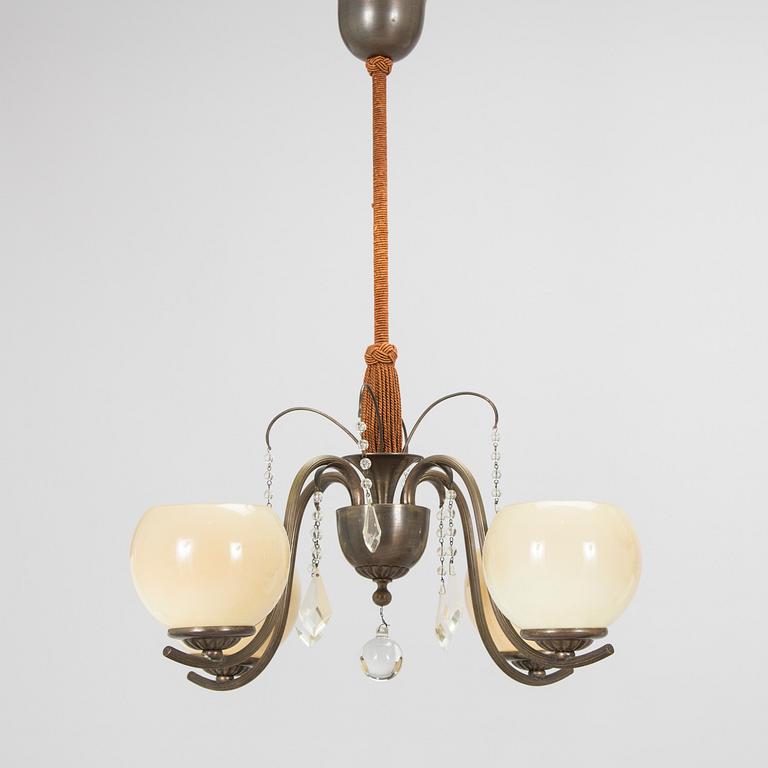 A 1930s model 326/4 ceiling lamp by Taidetakomo Antti Hakkarainen.