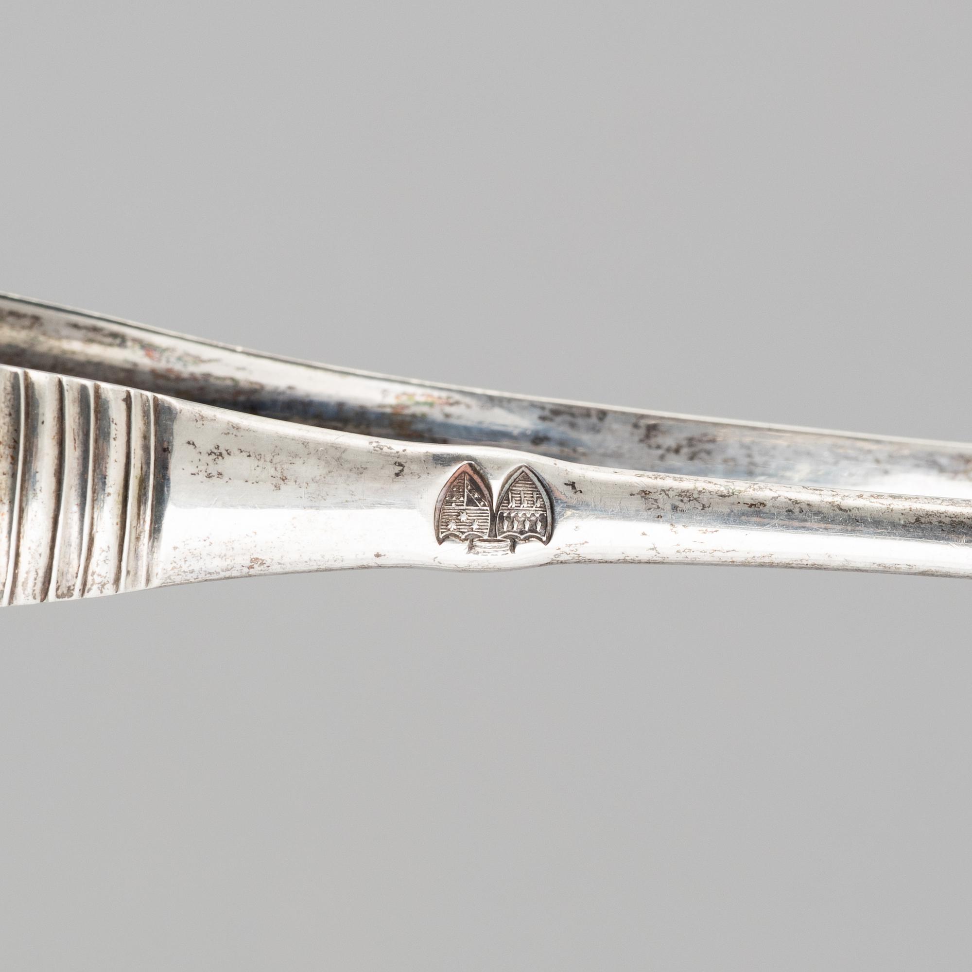 Three silver tongs, Sweden and Denmark, 1834-1923.