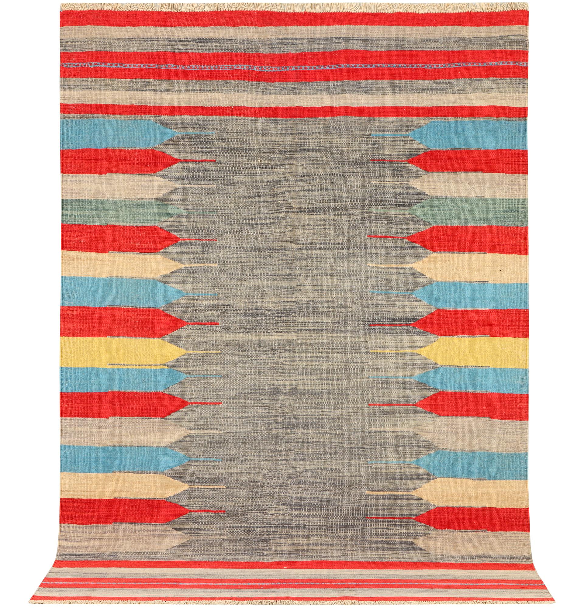 An Afghan Kilim carpet, c. 293 x 199 cm.