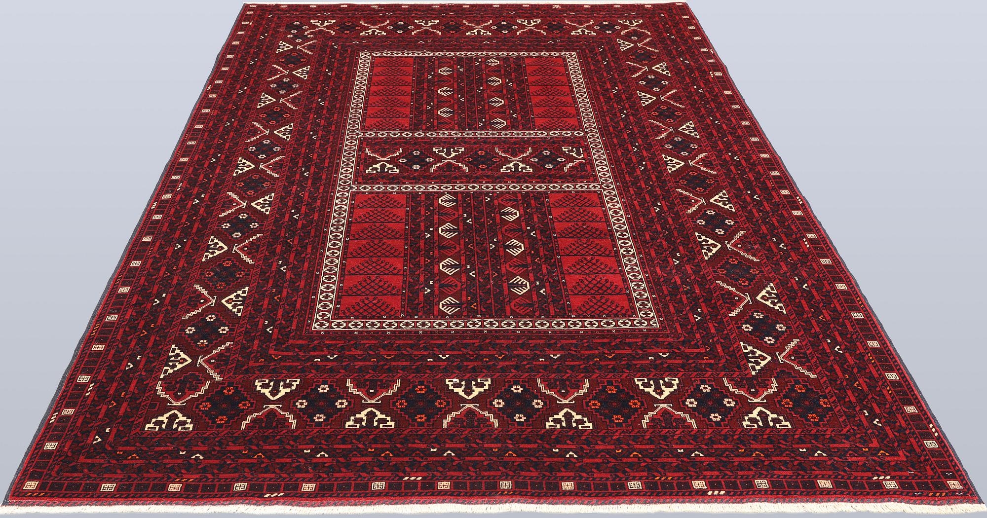 A Afghan carpet, 256 x 168 cm.