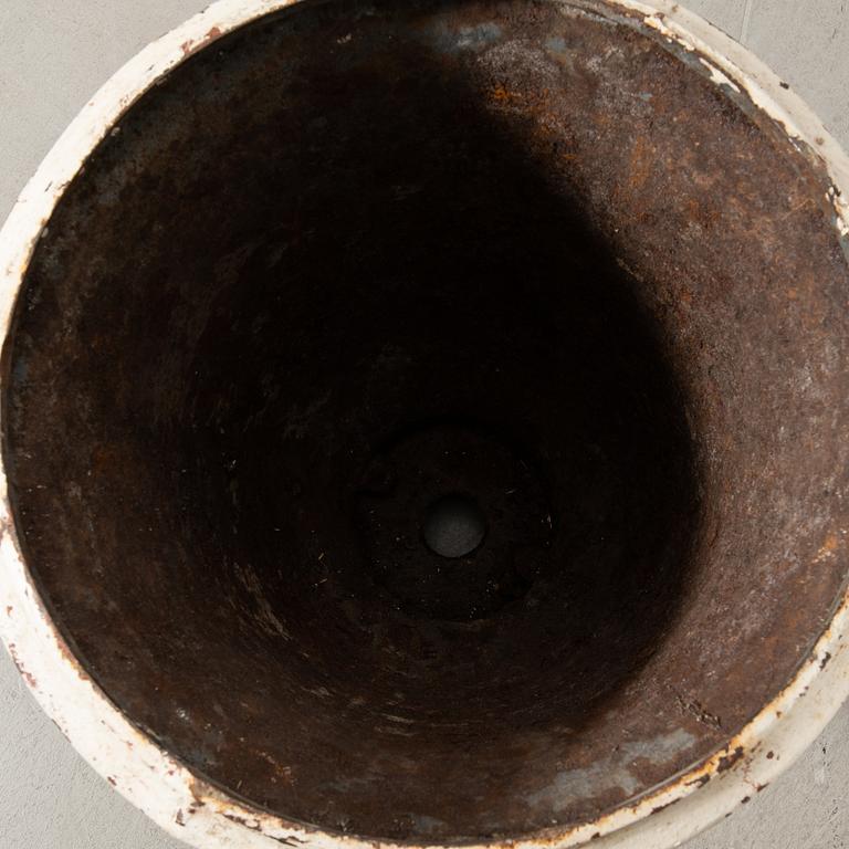 Urnor ett par gjutjärn omkring 1900.