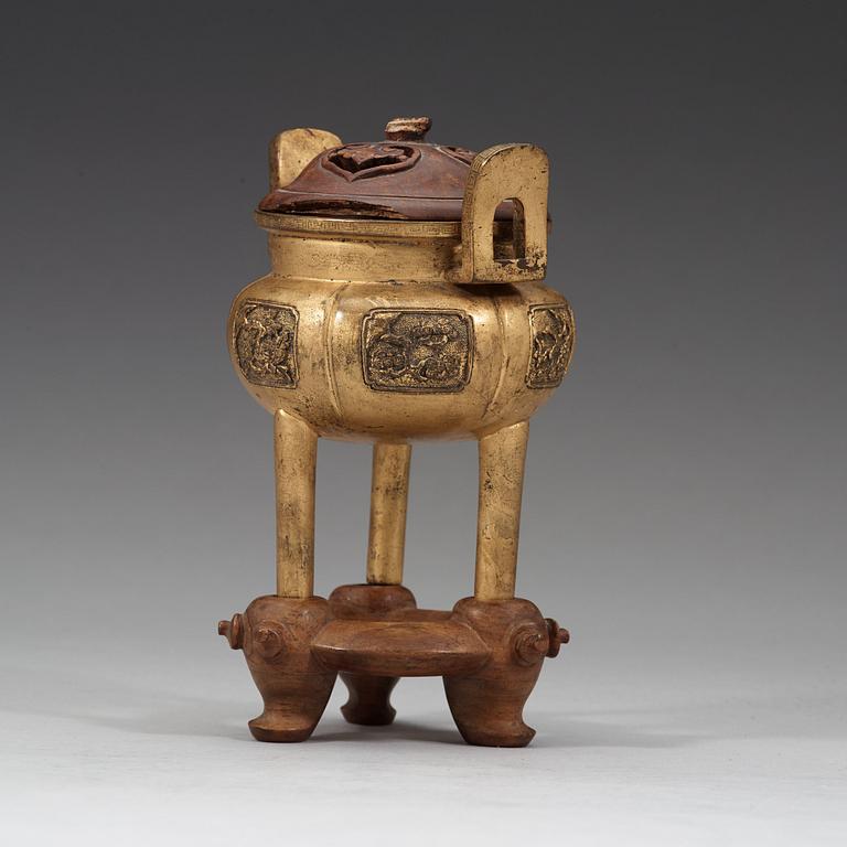 A bronze tripod censer, Qing dynasty, 19th Century.