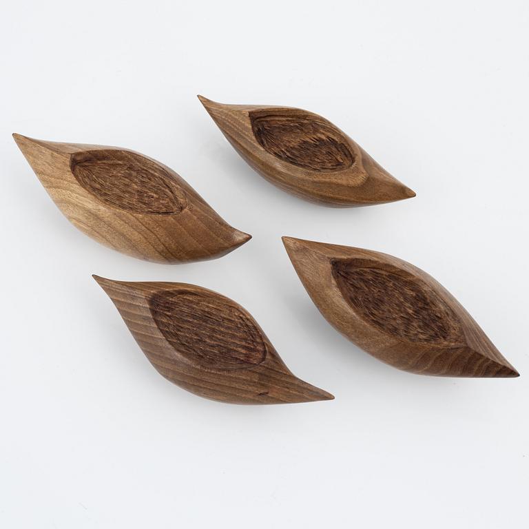 Magnus Ek, a set of four walnut wood canapé holders for Oaxen Krog.