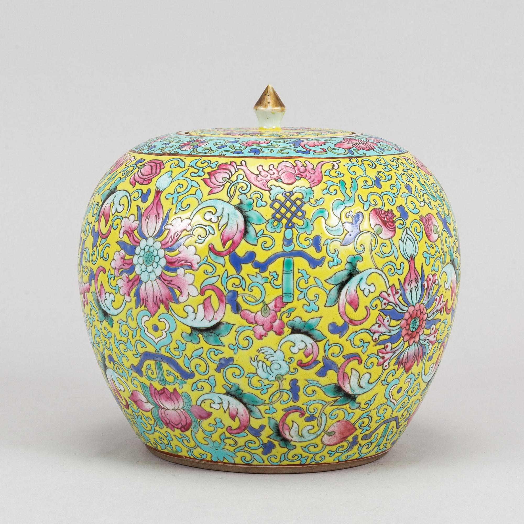 A yellow ground famille rose lotus jar, China, early 20th Century.