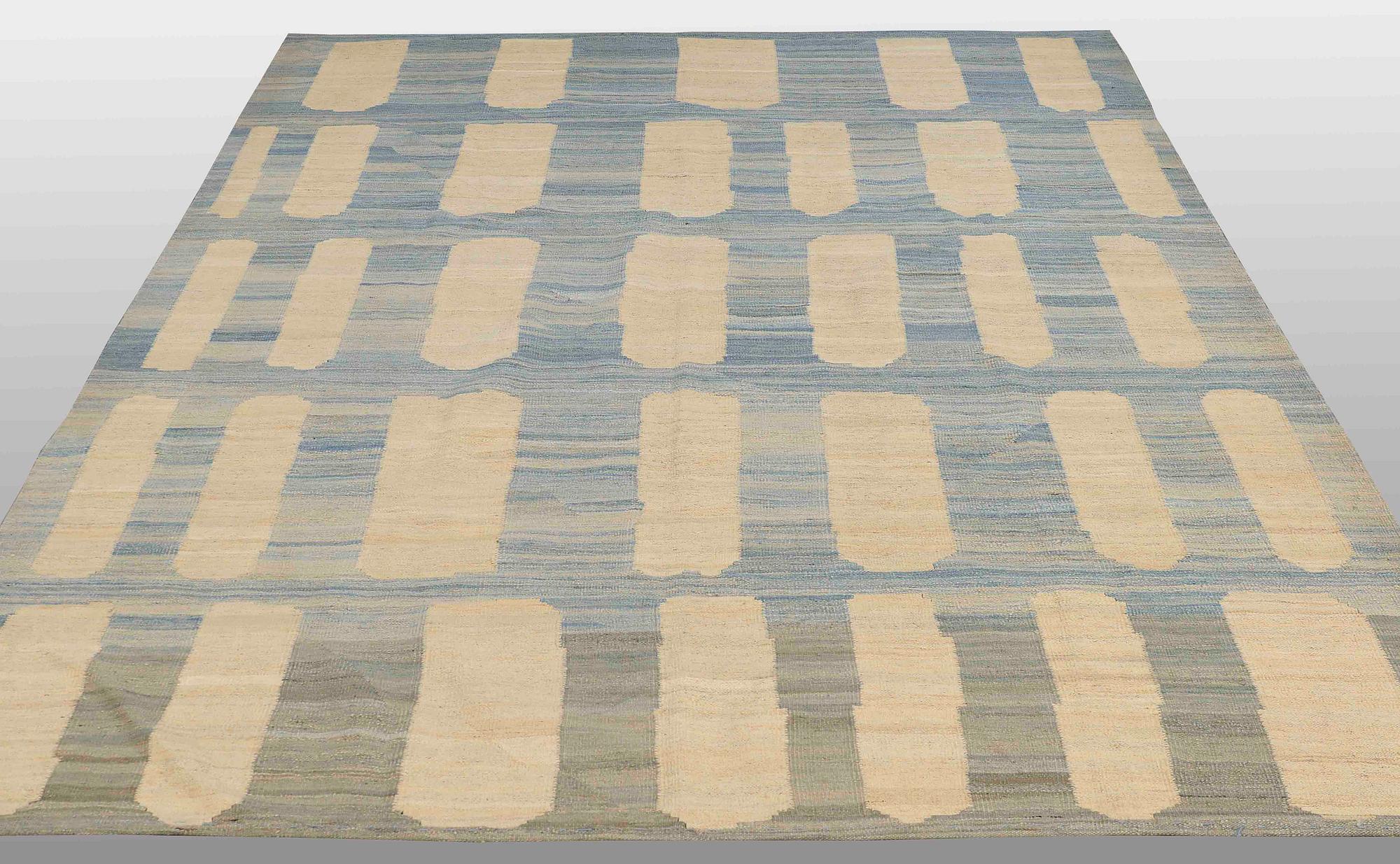 A flatweave rug, 285 x 222 cm.