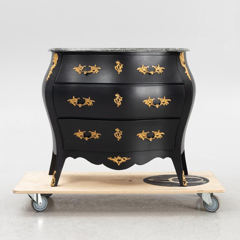 A Rococo style chest of drawers, mid 20th Century.