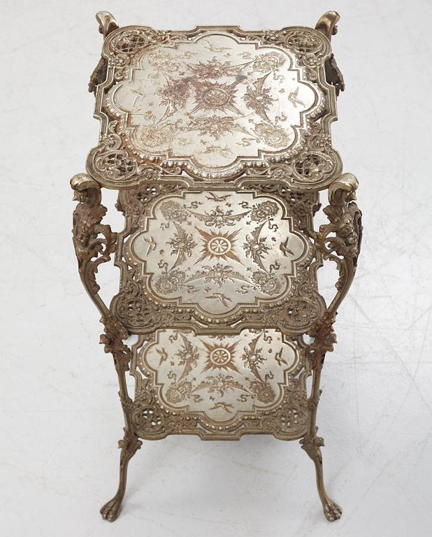 A three-tiered metal pedestal, first half of the 20th century.