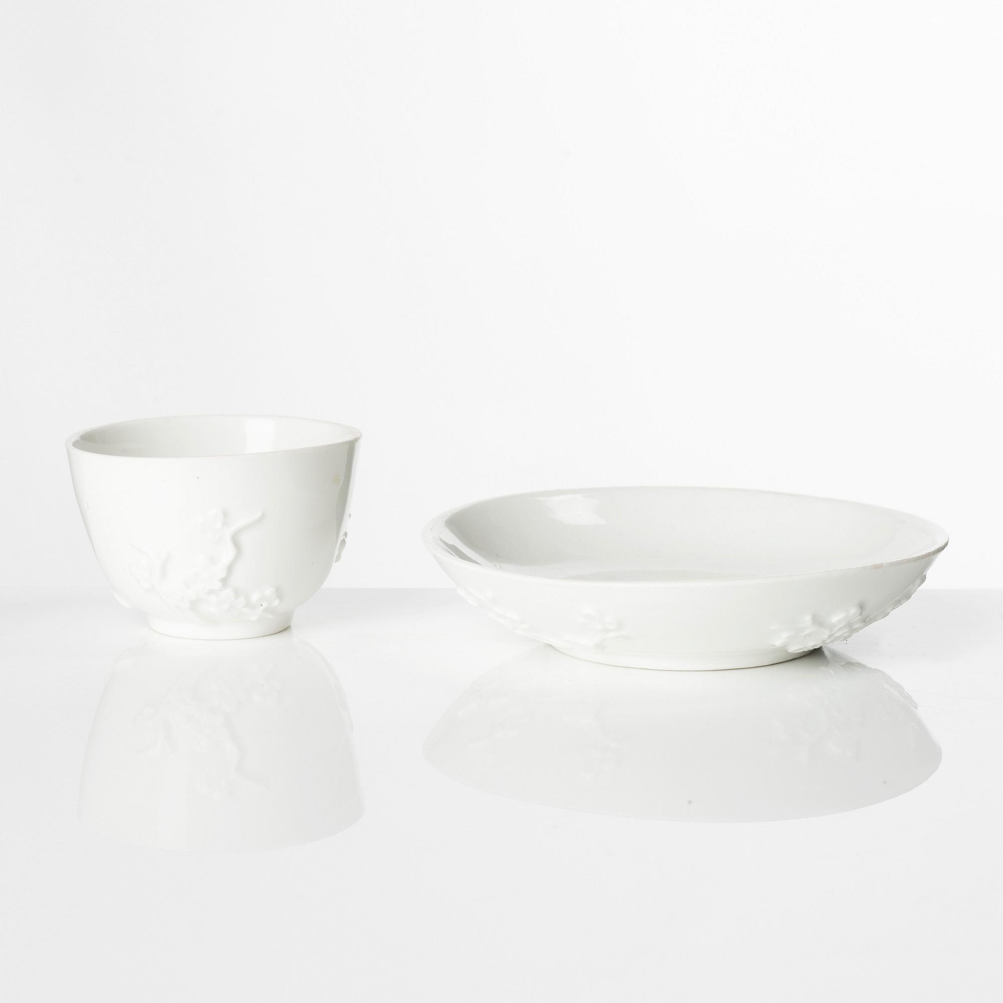 A blanc de Chine cup with saucer, Meissen, 18th century.