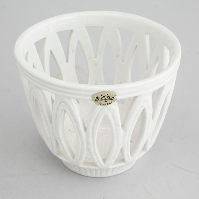 A pair of stoneware bowls, "Olympia", and a flower pot by Gunnar Nylund, Rörstrand, second half of the 20th century.