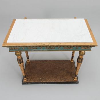 An early 20th century mirror with console table in late Gustavian style.