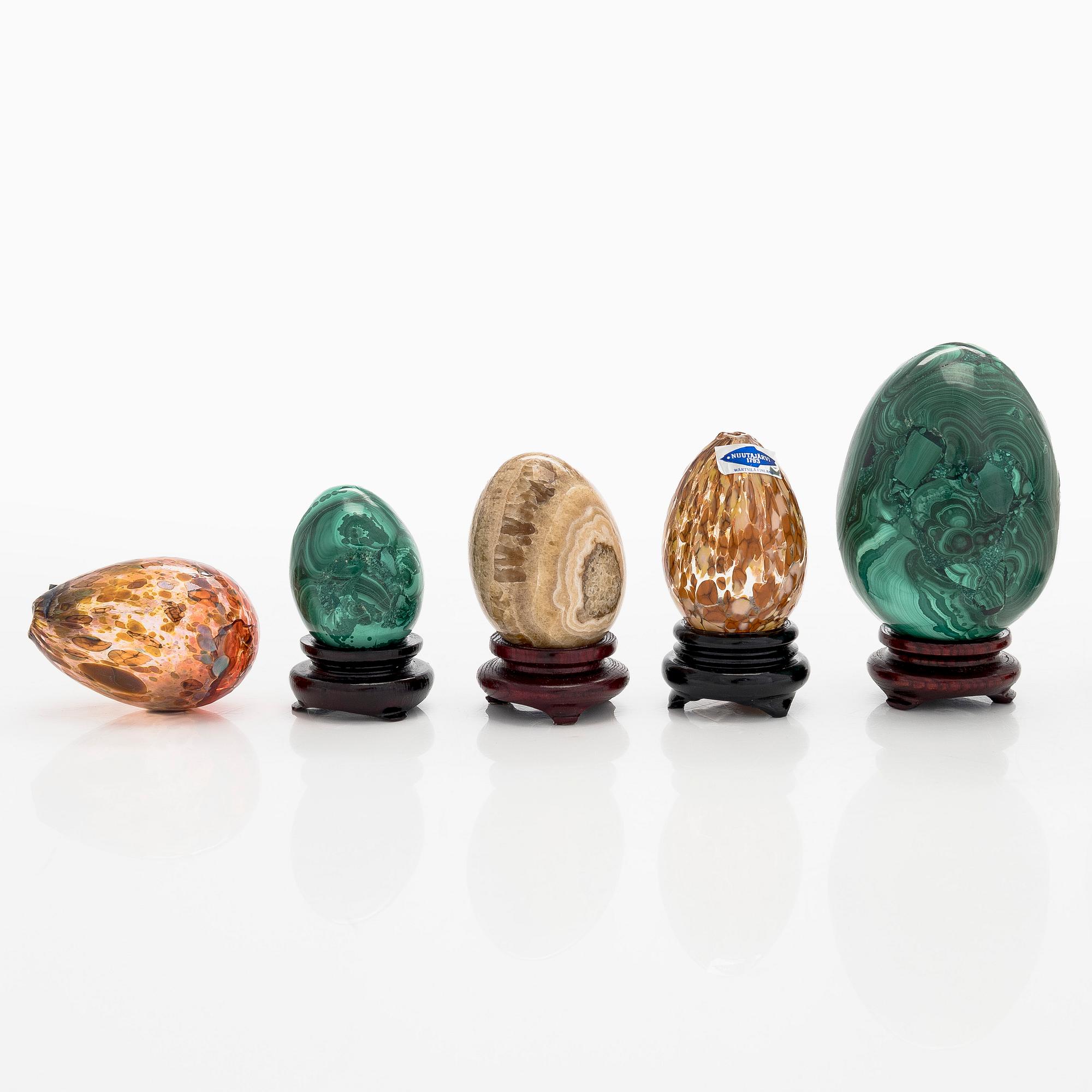A set of 10 glass and stone decorative eggs.