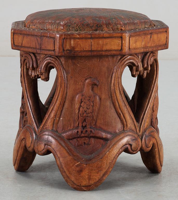 An Art Noveau sculptured pine stool probably by Knut Fjaestad, Sweden early 1900's.