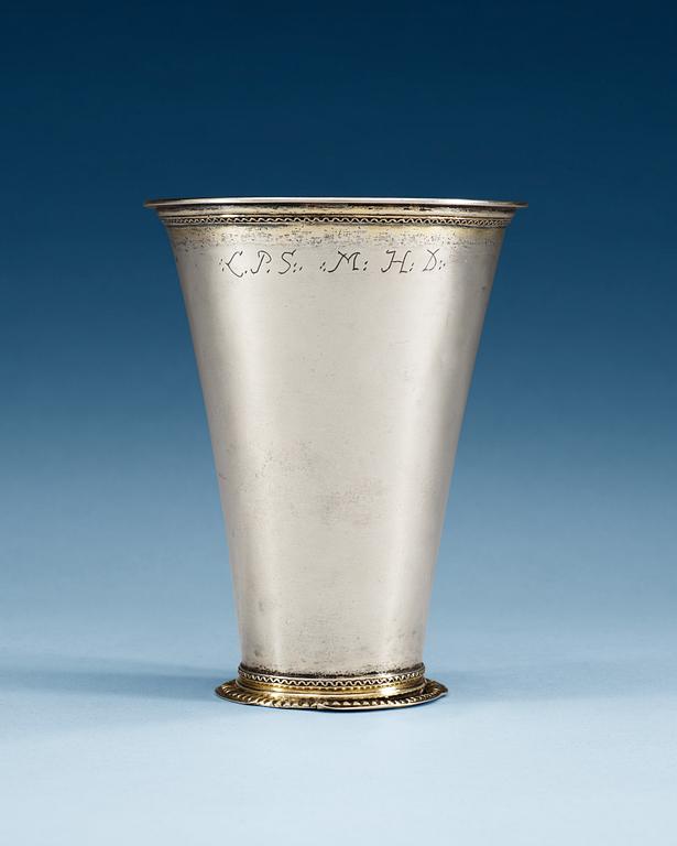 A SWEDISH PARCEL-GILT BEAKER, Makers mark of Hans Stadius widow, Kristianstad 1737.