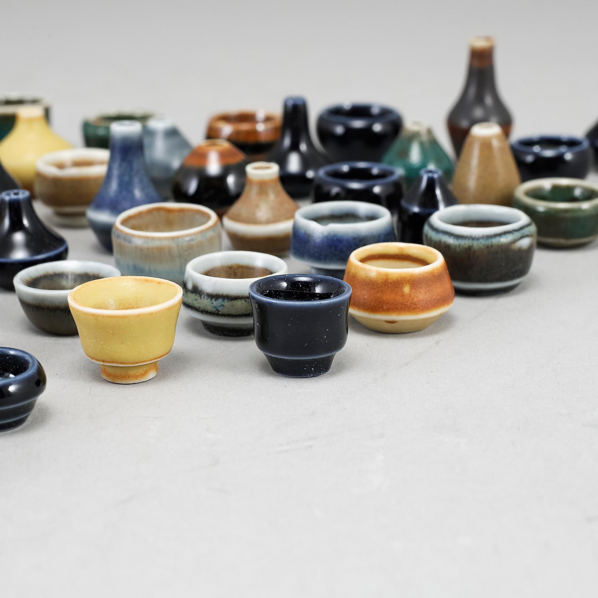 RÖRSTRAND, a set of 52 stoneware mini miniature vases and bowls.