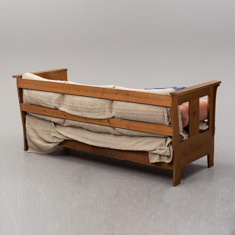 A eary 20th Century pine sofa attributed to Carl Westman.