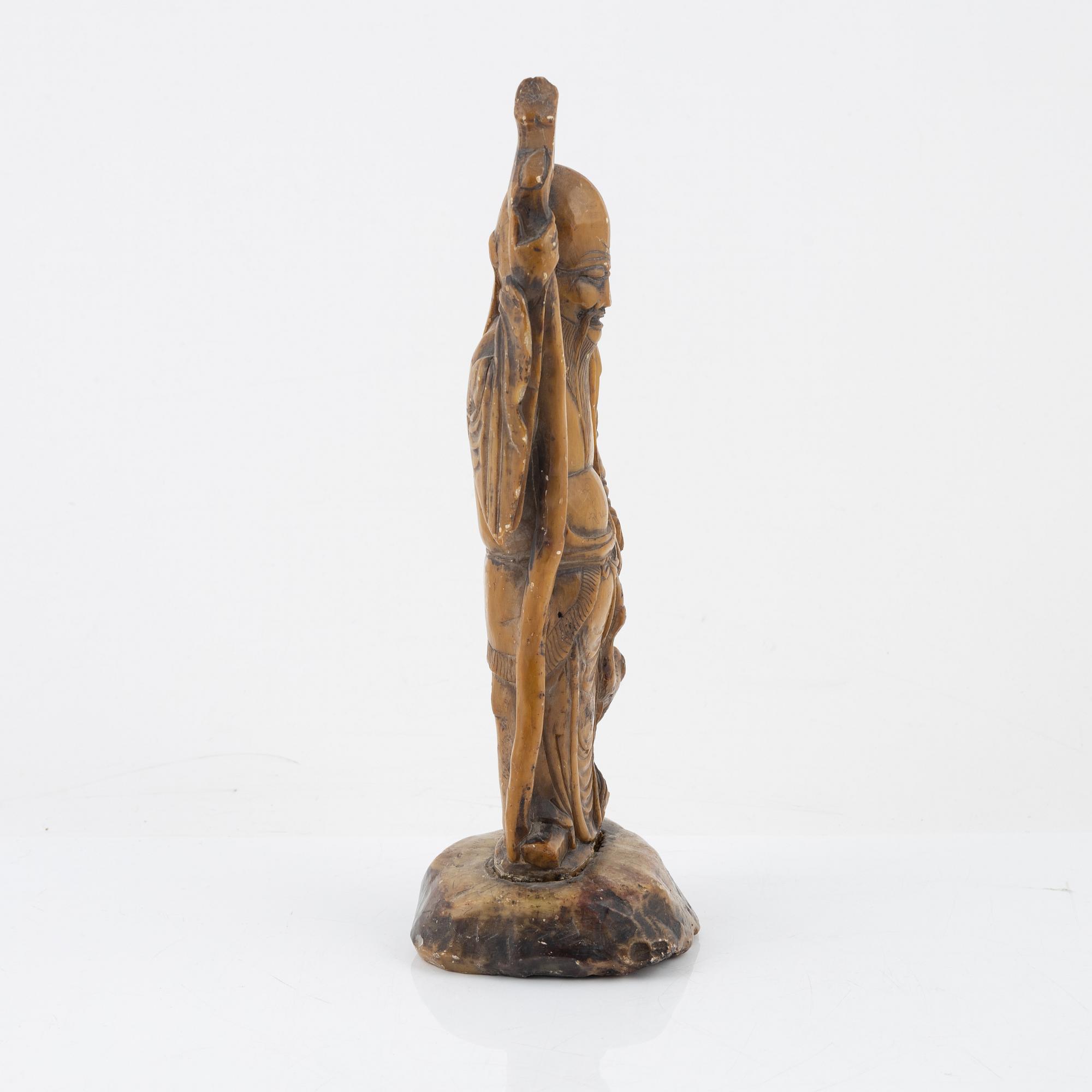 A soapstone figure of sholaou, China, 20th Century.