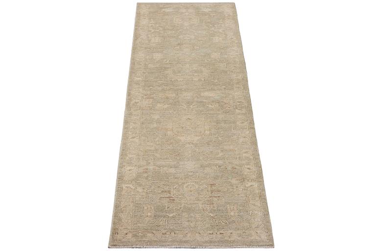 An Ushak runnercarpet, c. 295 x 87 cm.