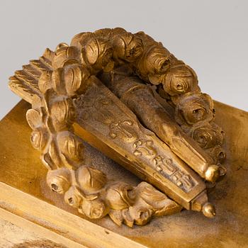 A French empire early 19th century mantel clock.