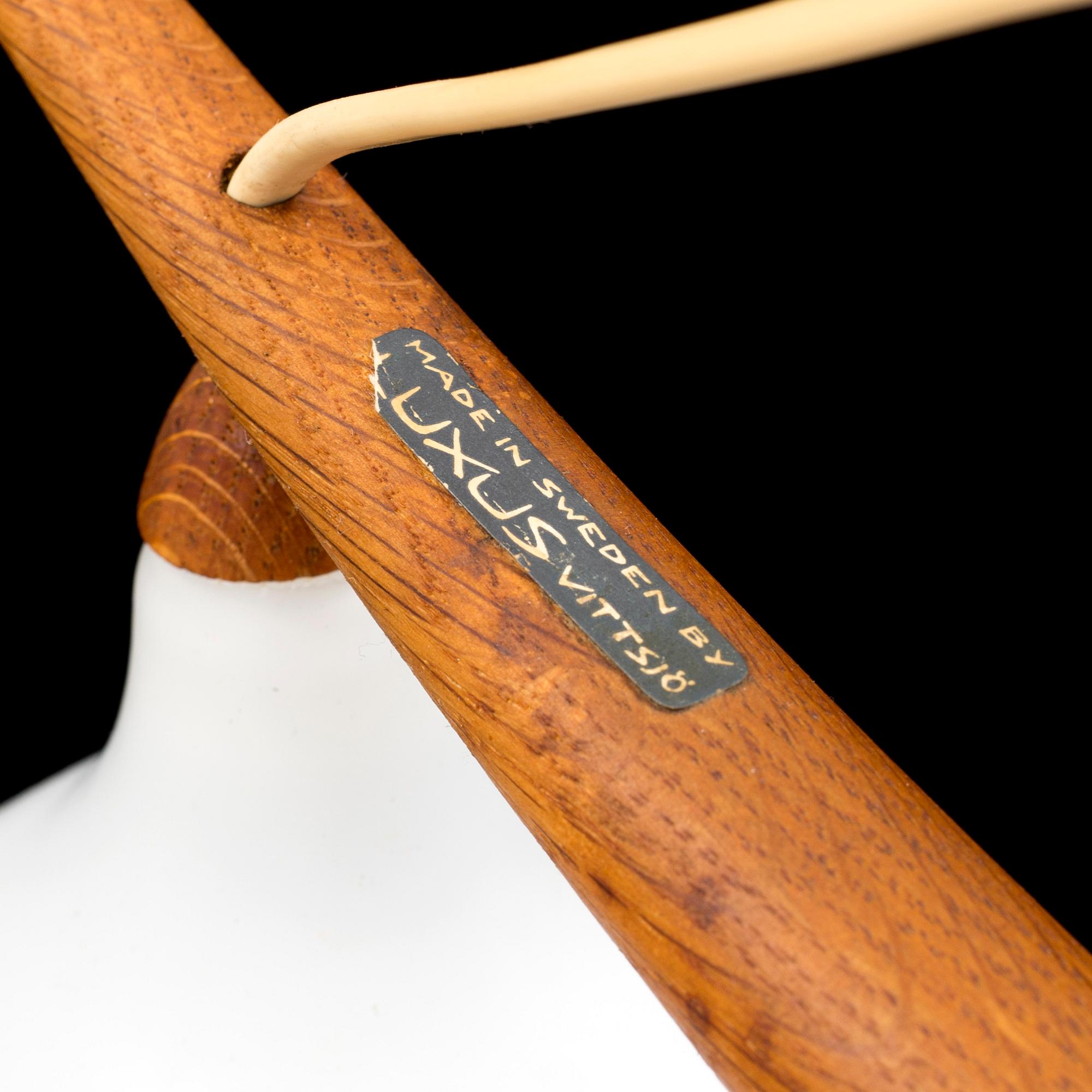 A teak and ceiling lamp by Uno & Östen Kristiansson, Luxus, Vittsjö.