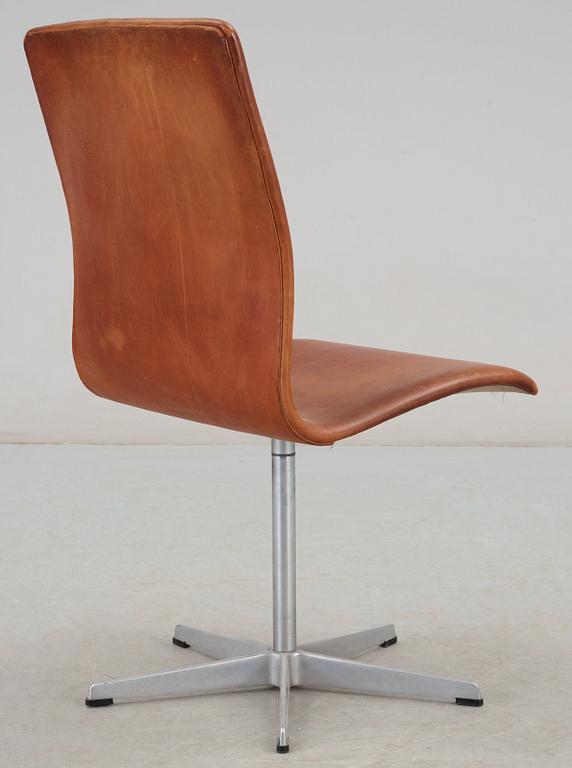 An Arne Jacobsen 'Oxford' brown leather and aluminium chair, Fritz Hansen, Denmark.