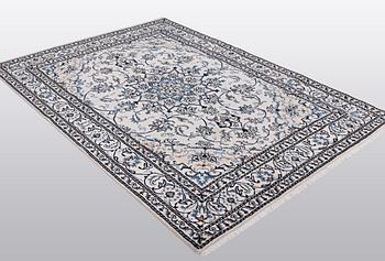 A rug, Nain, part silk, so called 9 LAA, ca 233 x 164 cm.
