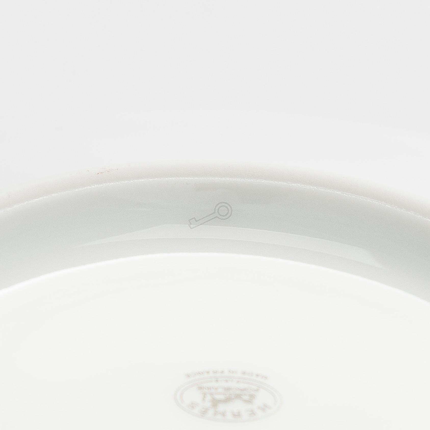 Hermès, cups with saucers, a pair, "Mosaique au 24".