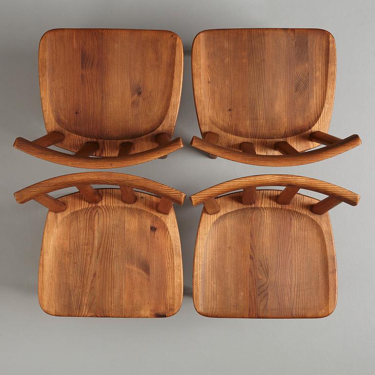 Axel Einar Hjorth, a set of four stained pine "Utö" chairs, Nordiska Kompaniet, Sweden 1930s.