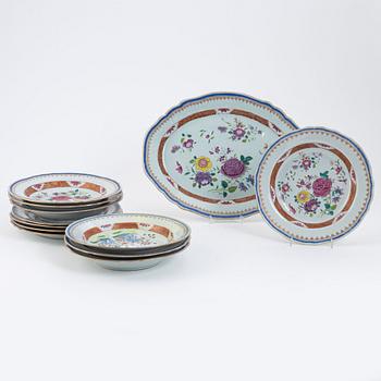 A set of 11 Chinese famille rose porcelain plates (7+4) and a serving dish, Qianlong (1736-1795).