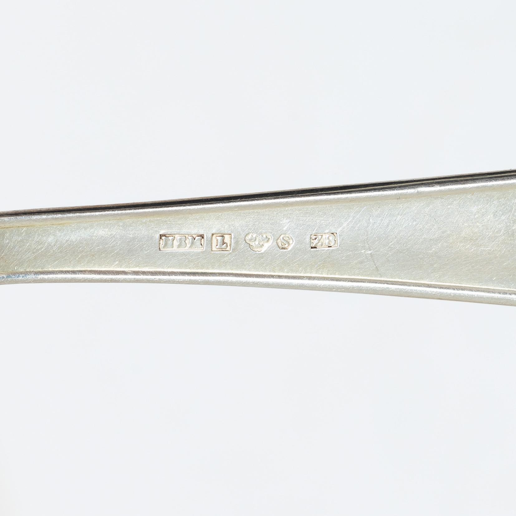 A 36 piece silver cutlery service, model Svensk Spets, mostly CG Hallberg, 1930s.