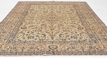 A carpet, Keshan, c. 306 x 214 cm.