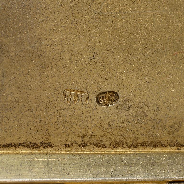 A Russian late 19th century parcel-gilt silver cigarette-case, unidentified makers mark, St. Petersburg.