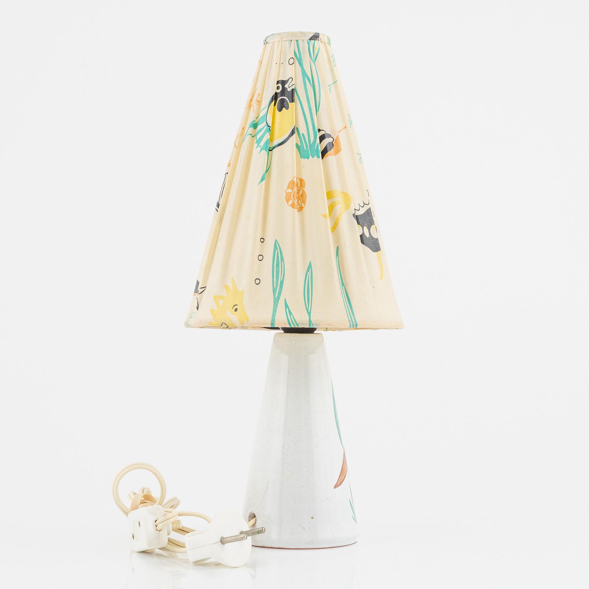 A Tilgmans table lamp with original lampshade.